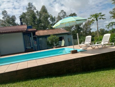 Sítio com casa , piscina quiosque jardim,pomar