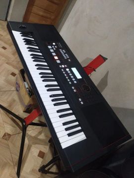 Teclado roland ex 50