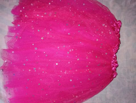 Vendo Saia nova de tule vermelha,rosa com glitter tamanho P M e G 