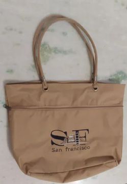 Bolsa tipo lona - importada