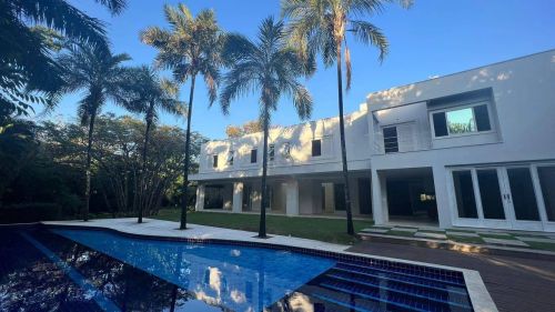 Casa com 6 dormitórios à venda, 973 m² por R$ 7.500.000,00 - Condomínio Helvetia Country -