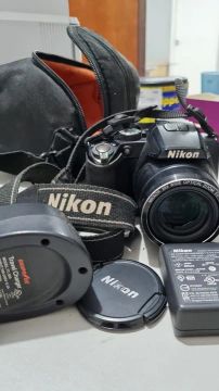 Camera Nikon Coolpix100 - retirada de peças