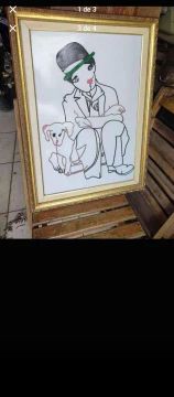 Quadro em madeira com imagem de Chaplin e cachorro
