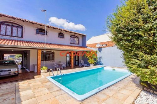 Casa com 4 quartos e 4 vagas para aluguel no Novo Mundo