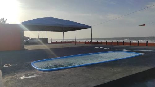 Casa de praia com piscina e churrasqueira
