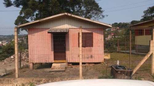 Terreno com casa