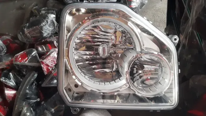 Farol do Jeep Cherokee Sport