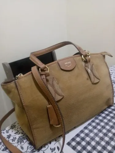 uma linda bolsa da arezzo