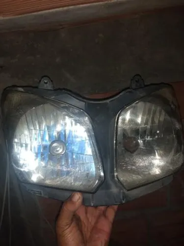 Farol da Suzuki vstron 2009