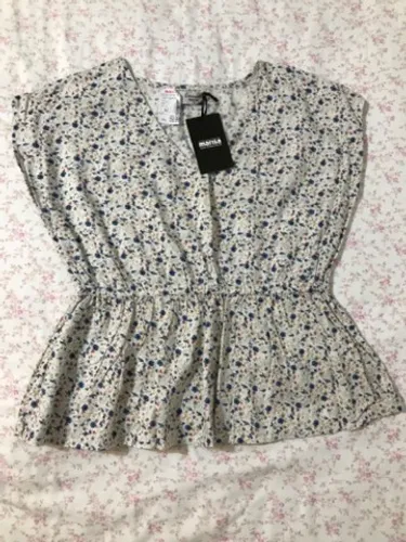 Blusa Marisa nova tamanho 42