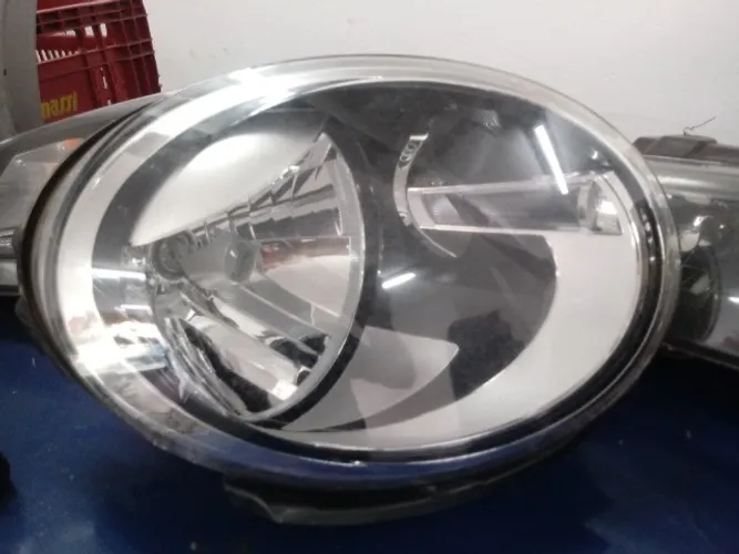 Farol esquerdo original  do Fusca 2014