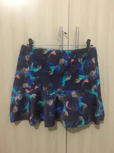 Saia peplum de malha estampada G