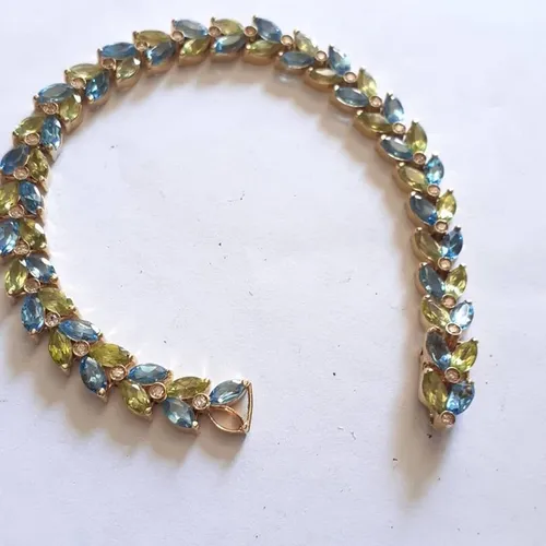 Pulseira em ouro amarelo modelo Riviera brilhantes topázio citrino 