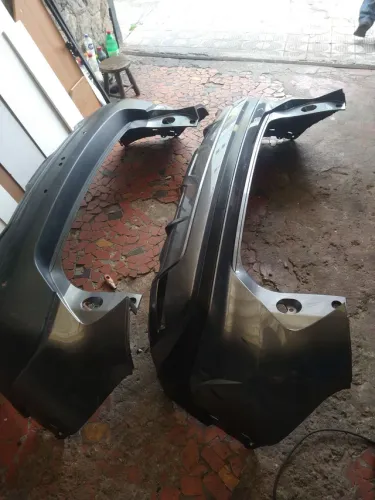 Para-choque traseiro Nissan quiks traseiro bom