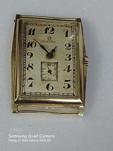 Relógio marca omega modelo retângula.r ouro amarelo década de 30