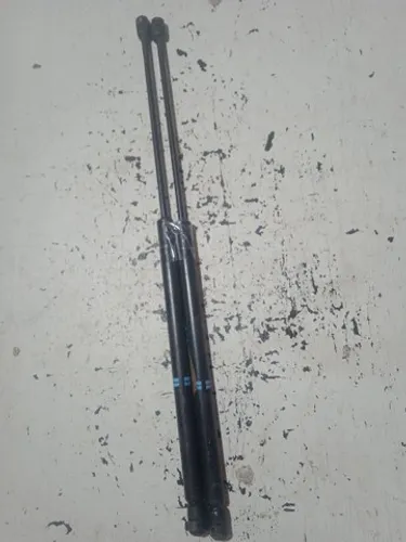 Amortecedor tampa traseira ford fiesta 2006/10 (par)