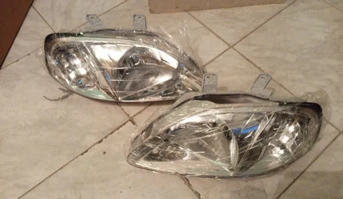 Farol Honda civic 99 ate 2006 novos