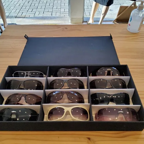 Óculos de sol com filtro 400 novos cada um 15,00 reais