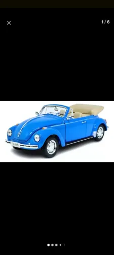 Miniatura Volkswagen Beetle. Marca Welly. Cor azul. Escala 1:24