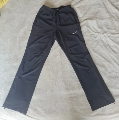 Calça Nike Running Dri-FIT Stretch Woven 683885-010 Preta Tamanho P
