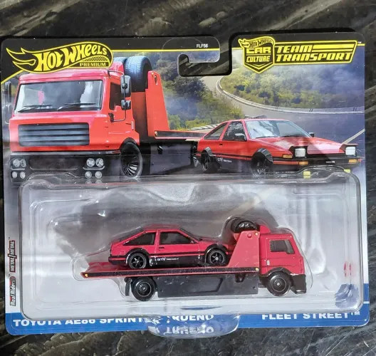 Hot Wheels com 2 team transport Lykan + Toyota
