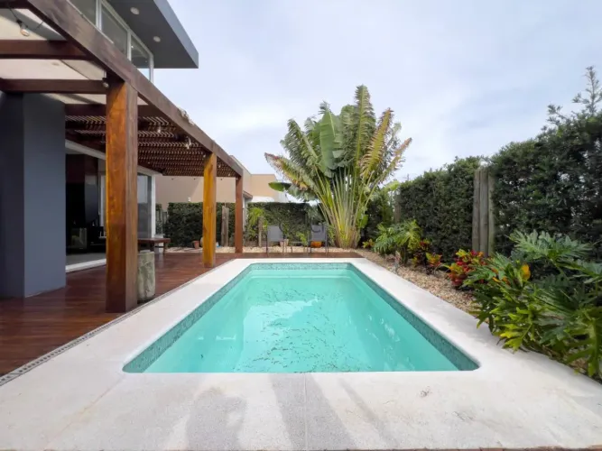 Casa mobiliada no Condominio Capão lhas Resort com 4 suítes e piscina em Capão da Canoa. R
