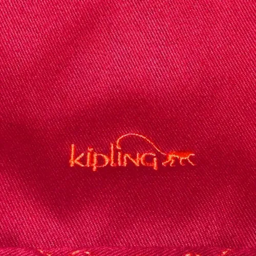Bolsa Kipling Art Mini vermelha com alça laranja e detalhes bordados. Em perfeito estado 