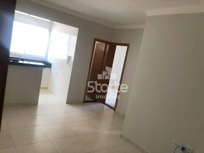 Apartamento com 2 dormitórios para alugar, 57m² por R$ 1.600/mês (incluso condomínio e águ