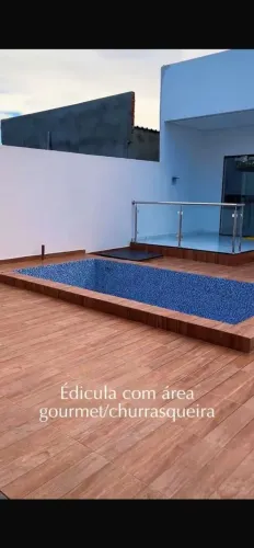 Casa com piscina 570 mil