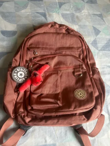 Mochila kipling rosa metálica