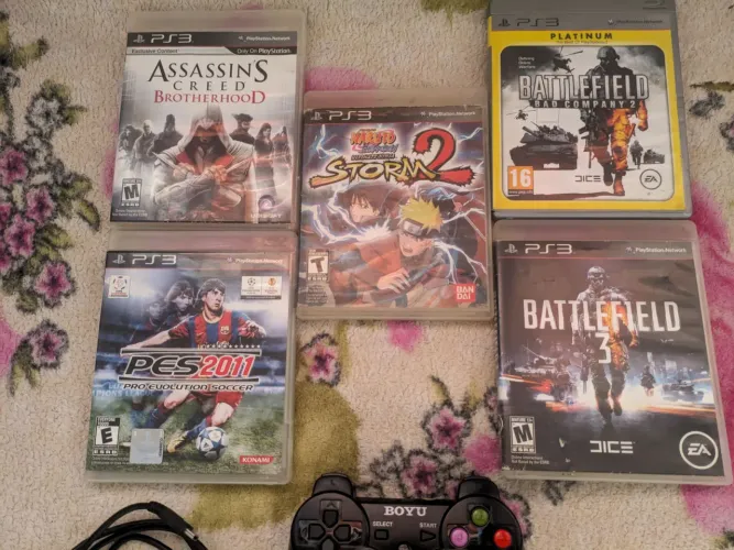 5 Jogos de PS3 originais e mais um controle PS3