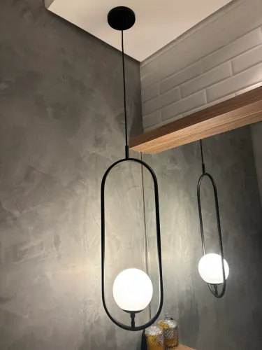 Arandela oval com luz globo