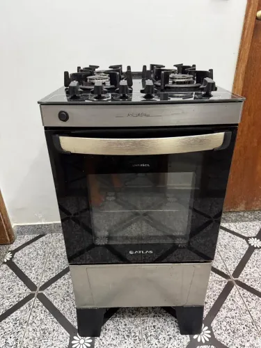 Vendo um fogão atlas 4 bocas vidro , estilo cooktop