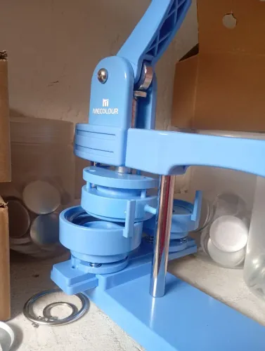 Máquina de bottons