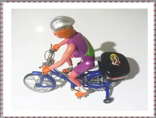 Boneco Bicicleta A Pilha Com Luz E Som Anda Sozinha