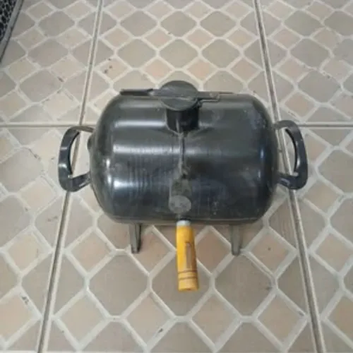 Churrasqueira de ferro á bafo.  Nova.