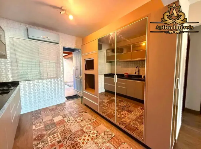 Apartamento térreo com amplo espaço externo em Meia Praia Navegantes