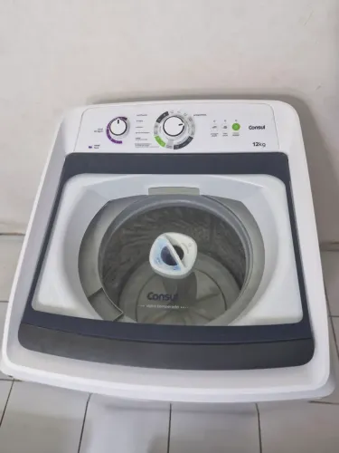 Máquina de lavar roupas com defeito