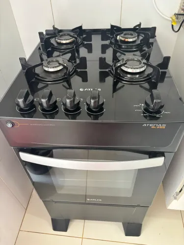 Fogão preto acendedor automático