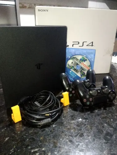 PS4 Slim 1TB, muito novo, impecável, na caixa.