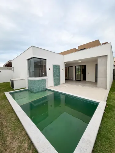 Casa para Venda em Rio das Ostras, Alphaville, 3 dormitórios, 3 suítes, 4 banheiros, 2 vag