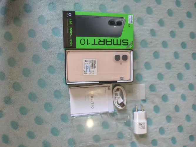 Vendo ou troco celular novo na caixa...