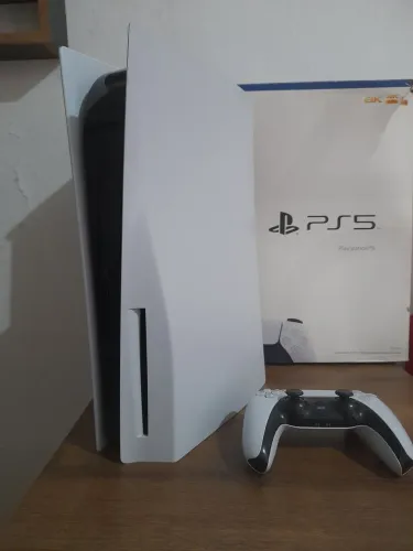 Ps5 com leitor de discos + controle original ( na caixa ) 