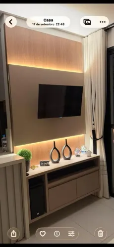 Painel de tv com tv