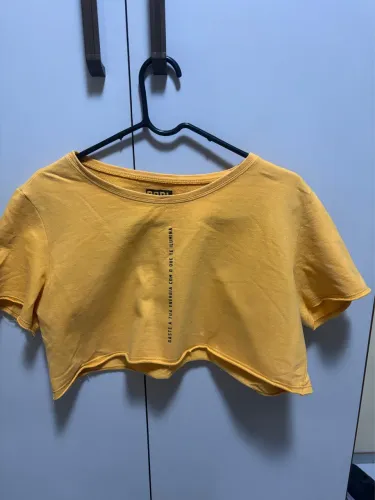 Top laranja mostarda e blusa do perna longa
