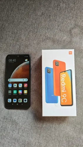 Celular Xiaomi Redmi 9C 128 GB cinza 4 GB RAM + caixa + manual