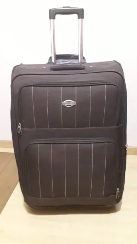 Mala de viagem Luxcel em poliéster (média/grande) com4 rodinhas e bem conservada