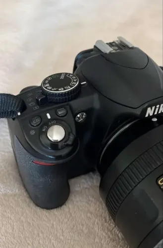 Camera Nikon D3100 com lente 18-300