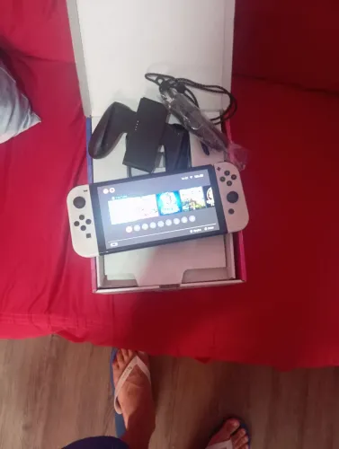 nintendo switch oled com mario kart 8 com cartao micro se 256gb usado é mais um controler