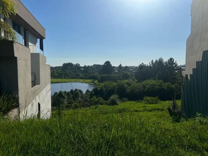 Terreno em condomínio frente para o lago, Horizon-EV